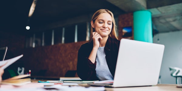 Businesswoman working on laptop